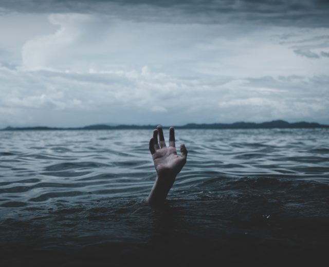 A person drowning on Blue Monday due to a mental health disease.
